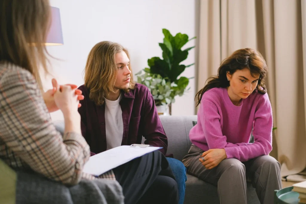 Three people in a meeting